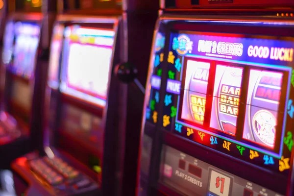 Caishen Wins slot game interface on piktoto alternatif mobile app showing five reels and spin button
